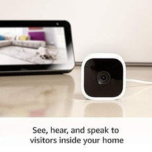 Load image into Gallery viewer, Blink Mini – Compact indoor plug-in smart security camera, 1080p HD video, night vision, motion detection, two-way audio, easy set up, Works with Alexa – 2 cameras (White)