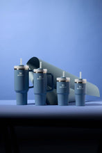 Load image into Gallery viewer, Stanley Quencher H2.0 Tumbler with Handle 20 oz | Screw Off Lid with Included Straw | Leakproof & Car Cupholder Compatible for Travel | Insulated Stainless Steel Cup for Water and More | Indigo