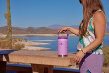 Load image into Gallery viewer, Stanley IceFlow Flip Straw Jug with Handle 64 oz| Twist On Lid and Flip Up Straw | Leak Resistant for Travel and Sports | Insulated Stainless Steel |BPA-Free |Lilac