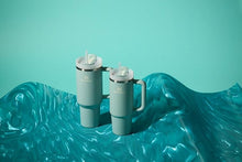 Load image into Gallery viewer, Stanley Quencher H2.0 Tumbler with Handle 40 oz | Screw Off Lid with Included Straw | Leakproof & Car Cupholder Compatible for Travel | Insulated Stainless Steel Cup for Water and More | Seafoam