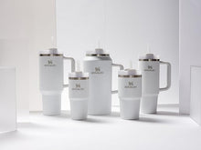 Load image into Gallery viewer, Stanley Quencher H2.0 FlowState Stainless Steel Vacuum Insulated Tumbler with Lid and Straw for Water, Iced Tea or Coffee, Smoothie and More, Frost, 64oz