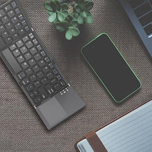 Load image into Gallery viewer, ROCK&ROWN Foldable Bluetooth Keyboard, Pocket Size Portable Wireless Keyboard with Touchpad for Mac OS,Android, Windows, Linux, PC, Tablet, with Rechargeable Li-ion Battery-Dark Gray
