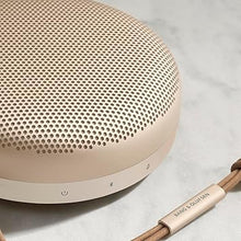 Load image into Gallery viewer, Bang & Olufsen Beosound A1 (2nd Generation) Wireless Portable Waterproof Bluetooth Speaker with Microphone, Gold Tone