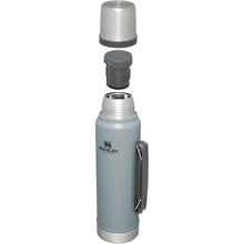 Load image into Gallery viewer, Stanley Classic Legendary Vacuum Bottle 1.1 qt | Wide Mouth with Leakproof Cup Lid | Keep Drinks Hot or Cold | Packable for Travel | Insulated Stainless Steel Thermos | BPA-Free | Hammertone Silver