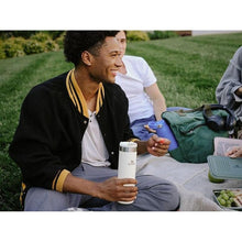 Load image into Gallery viewer, Stanley AeroLight Transit Bottle 20 oz Locking Drink Through Lid Leak Resistant Water Bottle or Coffee Travel Mug Lightweight Insulated Stainless Steel BPA-Free Cream