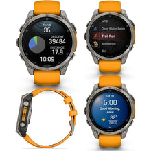 Load image into Gallery viewer, Wearable4U - Garmin Fenix 8 – 47 mm, AMOLED Sapphire Multisport GPS Smartwatch, Titanium with Spark Orange/Graphite Silicone Band, Built-in LED Flashlight with Black Earbuds Bundle