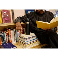 Load image into Gallery viewer, Stanley Quick Flip GO Water Bottle 24 oz | Push Button Lid | Leakproof and Packable for Travel and Sports | Insulated Stainless Steel | BPA-Free | Frost