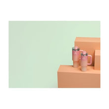 Load image into Gallery viewer, STANLEY Quencher H2.0 Tumbler with Handle and Straw 40 oz | Flowstate 3-Position Lid | Cup Holder Compatible for Travel | Insulated Stainless Steel Cup | BPA-Free | Pink Mesa Sunset