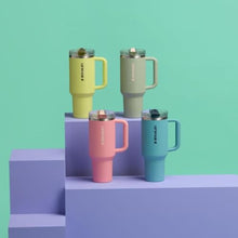 Load image into Gallery viewer, Stanley Quencher ProTour Flip Straw Tumbler with Leakproof Lid 40 oz | Built-In Straw and Handle | Cup Holder Compatible for Travel | Insulated Stainless Steel Cup | BPA-Free | Pink Mesa