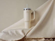 Load image into Gallery viewer, Stanley Quencher H2.0 FlowState Stainless Steel Vacuum Insulated Tumbler with Lid and Straw for Water, Iced Tea or Coffee, Smoothie and More, Cream 2.0, 40oz