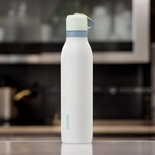 Load image into Gallery viewer, Owala FreeSip Twist Insulated Stainless Steel Water Bottle with Straw for Sports and Travel, BPA-Free, 24-oz, Green/White (Iced Breeze)
