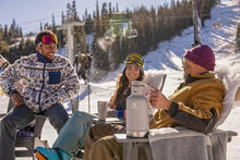 Load image into Gallery viewer, Stanley Classic Easy-Pour Insulated Growler Keeps Beer Cold &amp; Carbonated made with Stainless Steel Interior, Durable Exterior Coating &amp; Leak-Proof Lid, Easy to Carry Handle, 64 Oz, Cream Gloss
