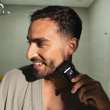 Load image into Gallery viewer, MANSCAPED® The Chairman™ PRO Men’s Foil Shaver - Two Interchangeable Blade Heads, SkinSafe® Four-Blade Foil &amp; Stubble Trimmer, Face Shaver, USB-C &amp; Wireless Compatible Charging, Gentle on Neck Area
