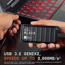 Load image into Gallery viewer, Western Digital 2TB P40 Game Drive SSD - Up to 2,000MB/s, RGB Lighting, Portable External Solid State Drive , Compatible with Playstation, Xbox, PC, &amp; Mac - WDBAWY0020BBK-WESN
