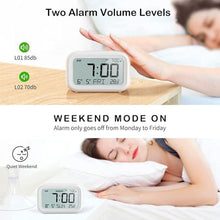 Load image into Gallery viewer, DOOMAY Digital Alarm Clock Bedside - Battery Powered Clock with LCD Display Volume Adjustable Snooze and Weekend Mode for Bedroom Office Desk Travel
