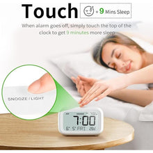Load image into Gallery viewer, DOOMAY Digital Alarm Clock Bedside - Battery Powered Clock with LCD Display Volume Adjustable Snooze and Weekend Mode for Bedroom Office Desk Travel

