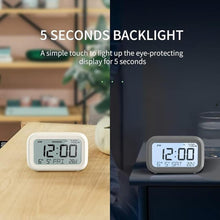 Load image into Gallery viewer, DOOMAY Digital Alarm Clock Bedside - Battery Powered Clock with LCD Display Volume Adjustable Snooze and Weekend Mode for Bedroom Office Desk Travel
