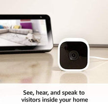 Load image into Gallery viewer, Blink Mini - Compact indoor plug-in smart security camera, 1080p HD video, night vision, motion detection, two-way audio, easy set up, Works with Alexa 2 cameras (White)_2709
