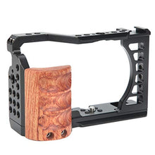 Load image into Gallery viewer, Vlog Camera Cage for A7C, Camera Video Stabilizer Cage Kit with Wooden Handle Grip, with 1/4in &amp; 3/8in Screw Hole and Cold Shoe Mount_1
