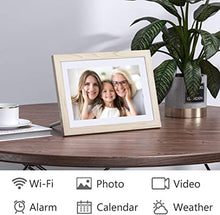 Load image into Gallery viewer, Dragon Touch Digital Picture Frame WiFi 10 inch IPS Touch Screen HD Display, 16GB Storage, Auto-Rotate, Share Photos via App, Email, Cloud - Classic 10
