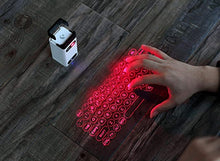 Load image into Gallery viewer, AGS World&#39;s Most Advanced Wireless Laser Projection Bluetooth Virtual Keyboard &amp; Mouse for iPhone, Ipad, Smartphone and Tablets
